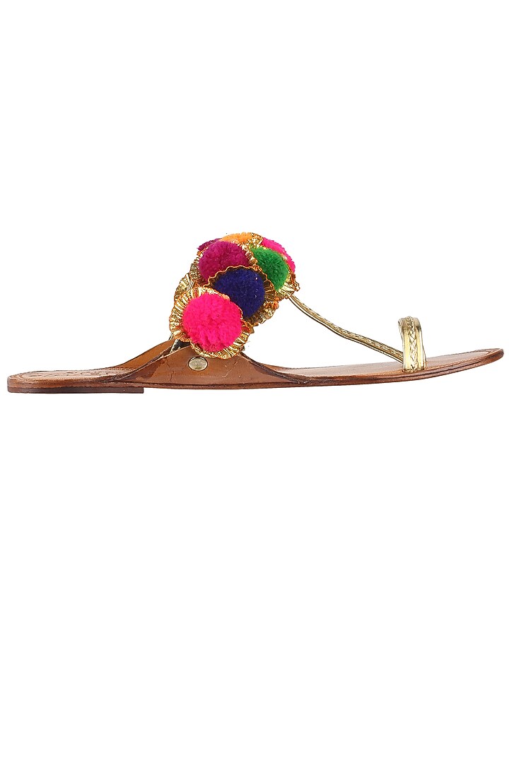 Nude kolhapuri flats with gotta flowers and multi coloured pompoms available only at Pernia's Pop Up Shop.