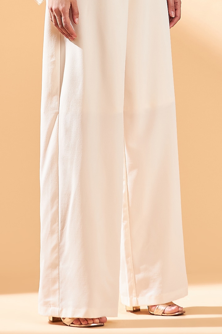 Ecru Colored Moss Crepe Jumpsuit With Belt by Aakaar at Pernia's Pop Up Shop