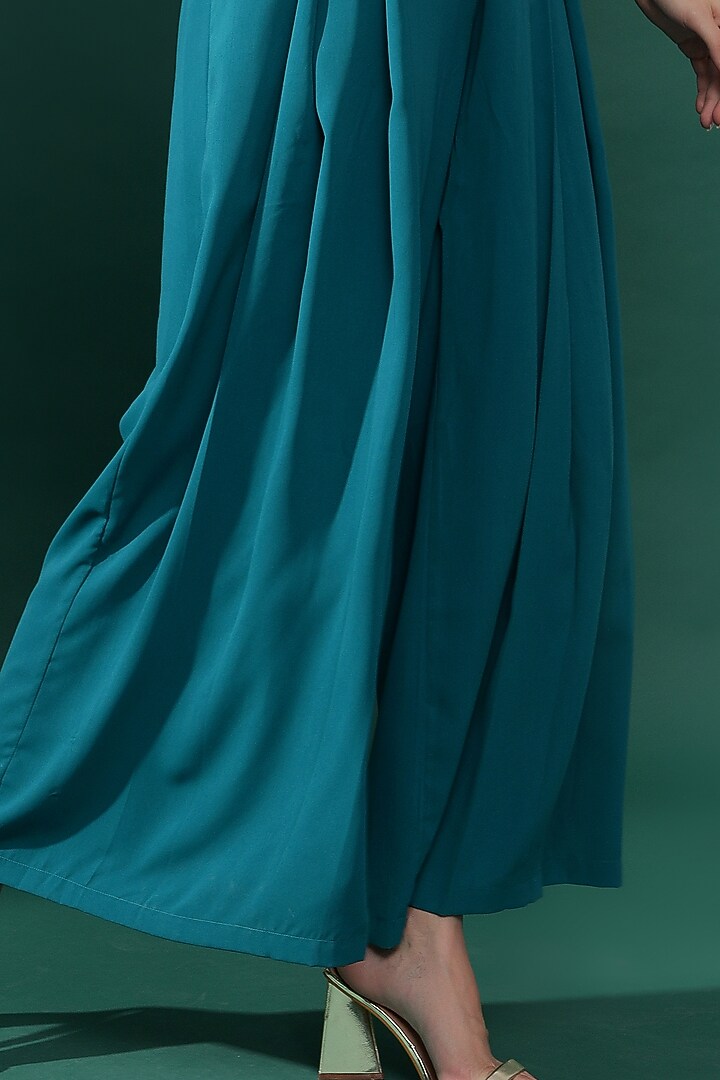 Blue Moss Crepe Sequins Embellished Pleated Jumpsuit by Aakaar at Pernia's Pop Up Shop
