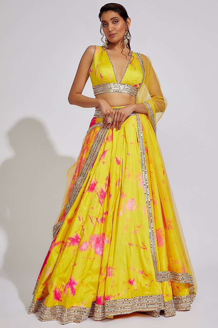 Yellow Raw Silk Tie-Dye Lehenga Set by Akanksha Gajria