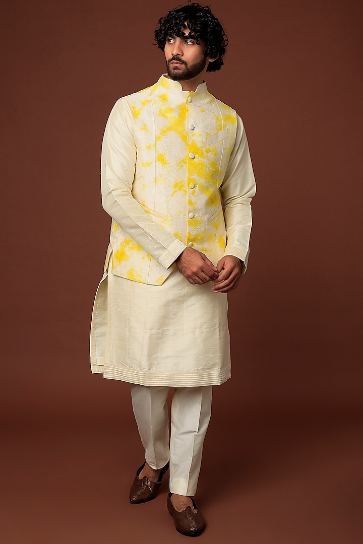 Cream Raw Silk Kurta Set With Bundi Jacket by Akanksha Gajria Men
