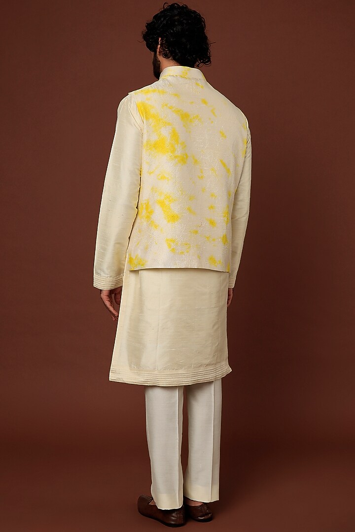 Cream Raw Silk Kurta Set With Bundi Jacket by Akanksha Gajria Men at Pernia's Pop Up Shop