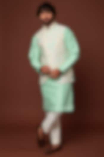 Mint Raw Silk Kurta Set With Bundi Jacket by Akanksha Gajria Men