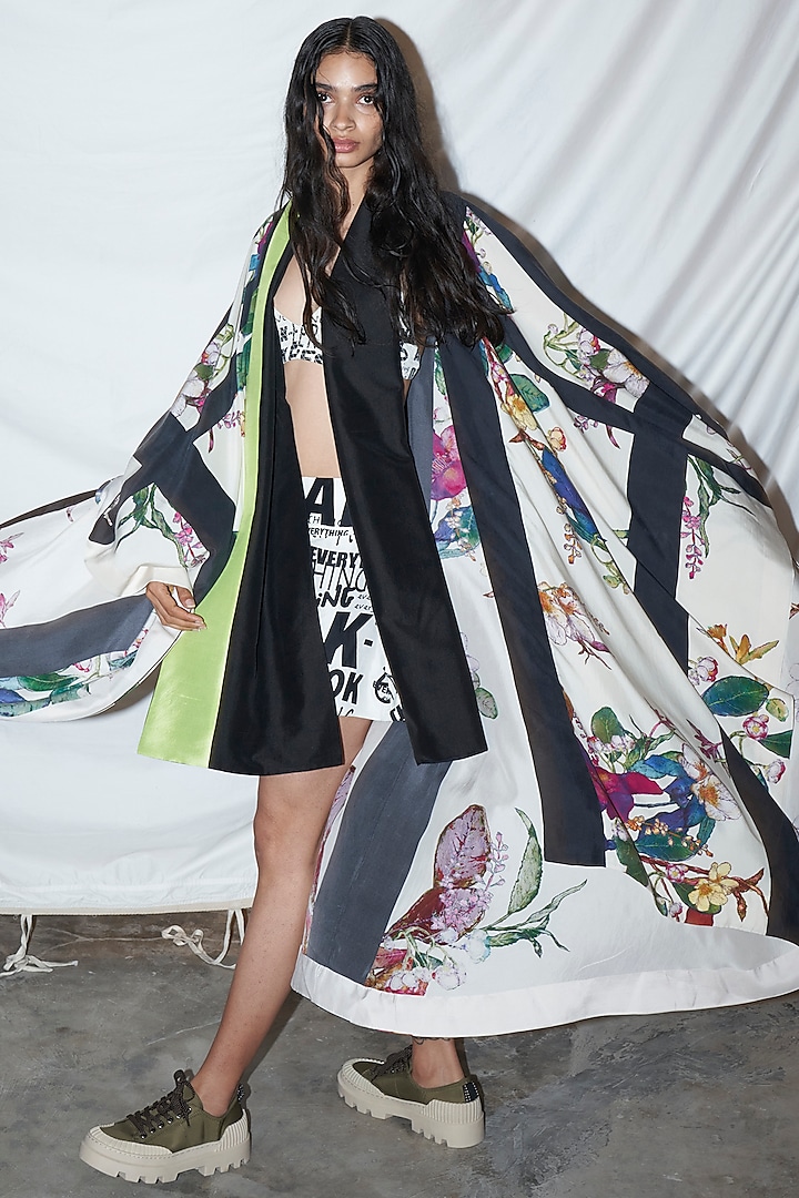 Off White & Black Printed Wrap Cape With Belt by AKOK at Pernia's Pop Up Shop