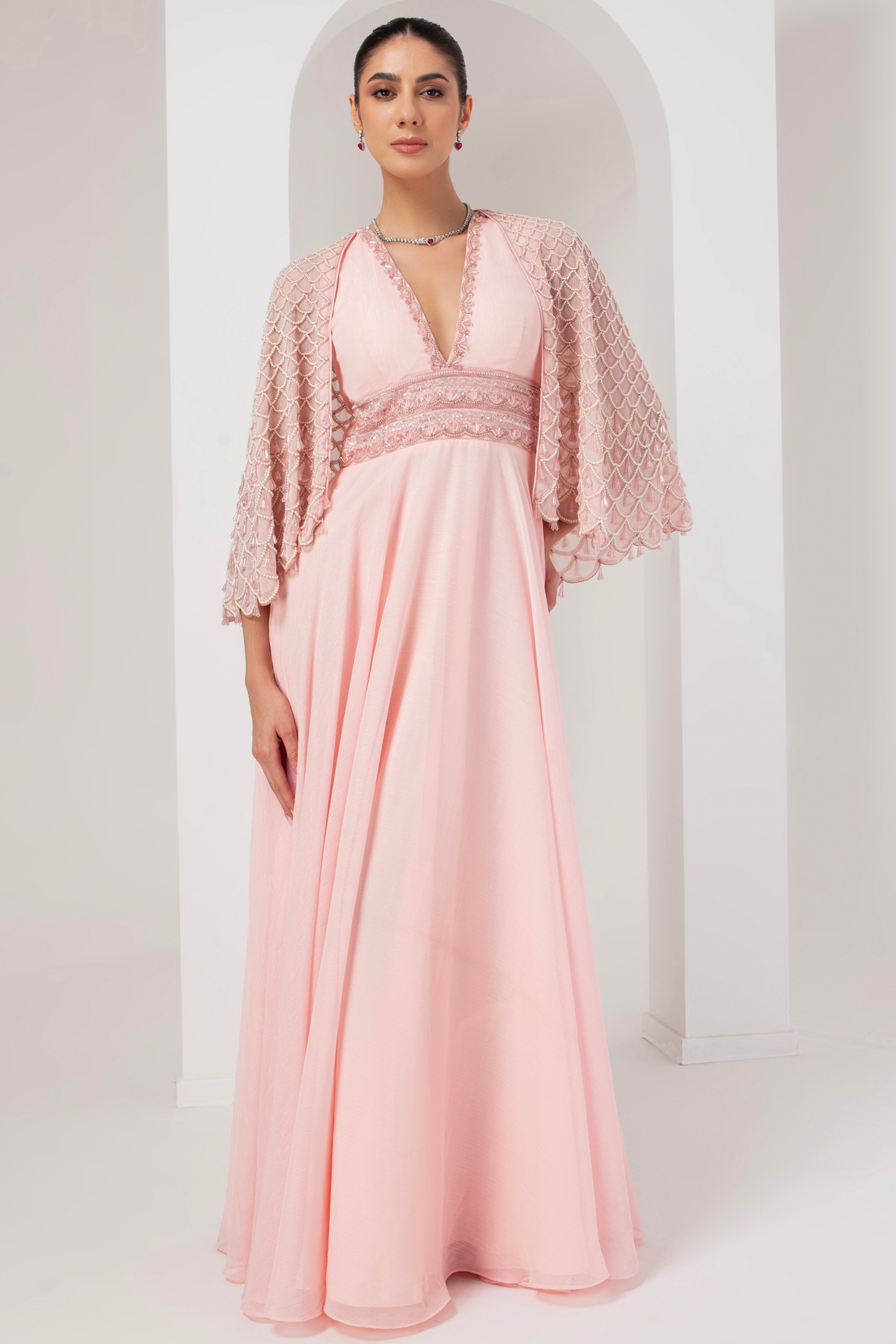 Pastel Pink Metallic Georgette Party Wear Dress With Embellished Cape by AKARA at Pernia's Pop Up Shop 2026 Pastel Pink Metallic Georgette Party Wear Dress With Embellished Cape by AKARA at Pernia's Pop Up Shop 2026