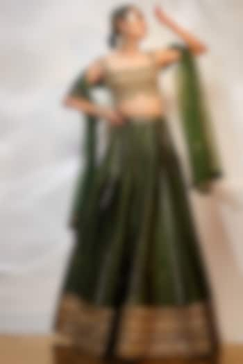 Green & Gold Dola Silk Hand Embellished Wedding Lehenga Set by AKARA at Pernia's Pop Up Shop