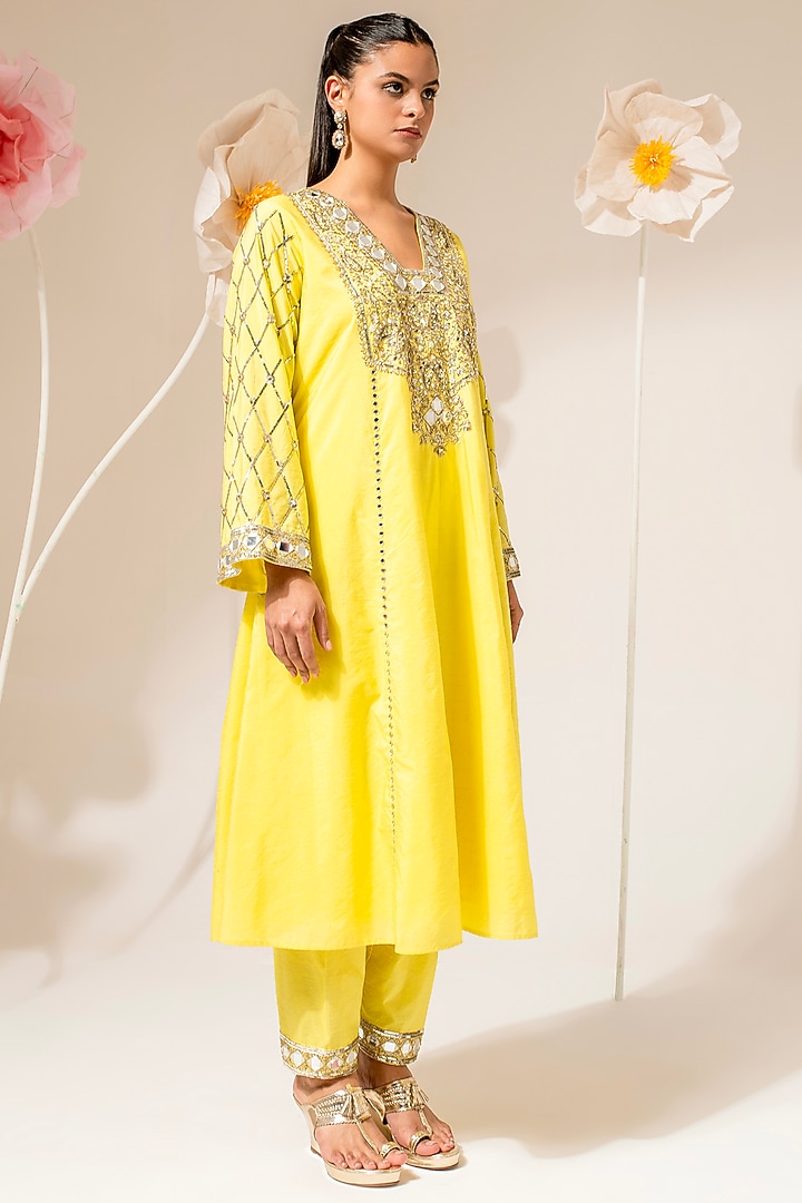 Yellow Dola Silk Embellished Kurta Set by AKARA at Pernia's Pop Up Shop