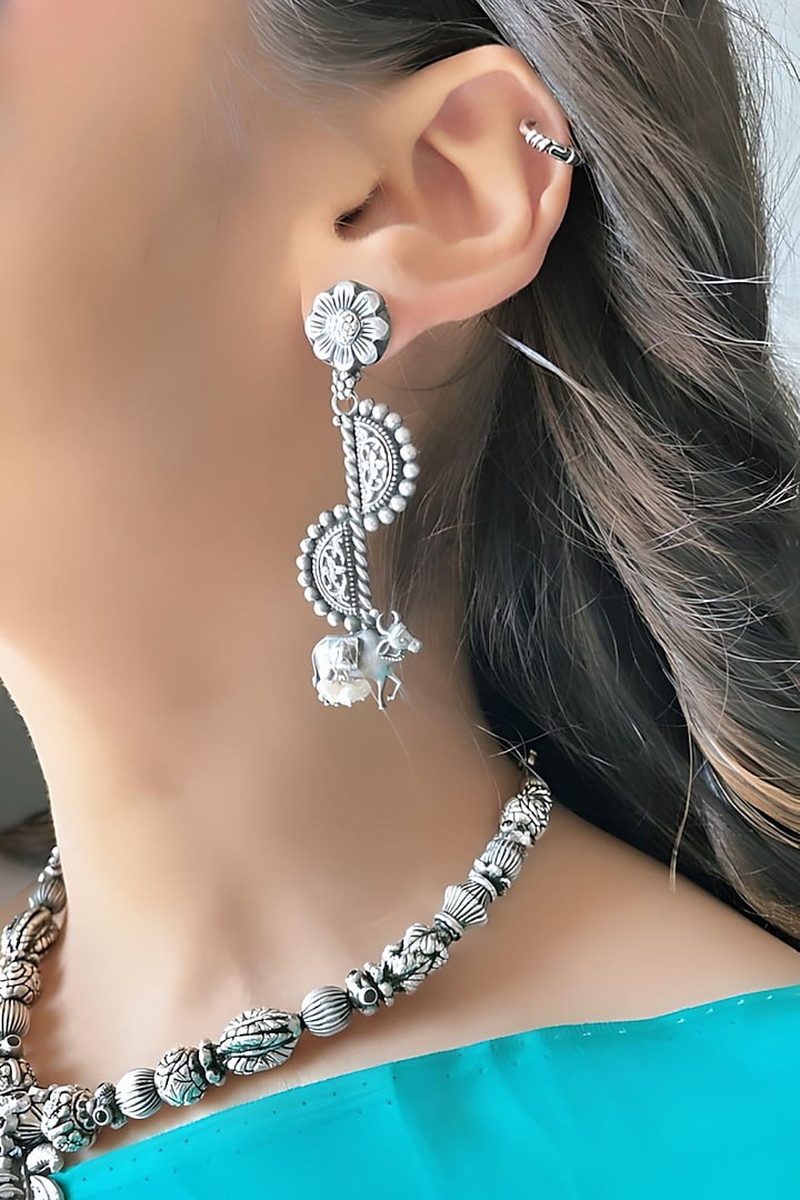 Silver Finish Kamadhenu Jhumka Earrings In Sterling Silver by Akarsaka 92.5 Silver at Pernia's Pop Up Shop
