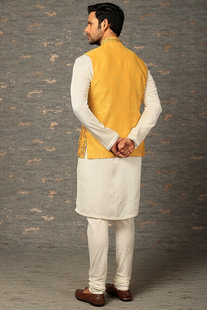 Yellow Silk Aari Embroidered Bundi Jacket Set by Attire by kunal & Sid j at Pernia's Pop Up Shop