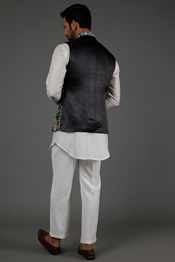 Black Dupion Silk Aari Embroidered Bundi Jacket Set by attire by kunal & Sid j at Pernia's Pop Up Shop