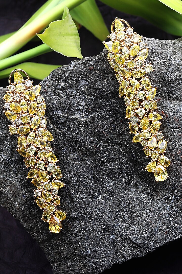 White Finish Gold Cubic Zirconia Dangler Earrings by Akulya Jewels at Pernia's Pop Up Shop