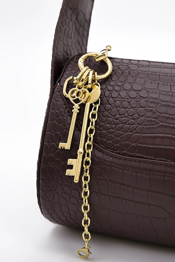 Chocolate Brown Genuine Leather Metallic Embellished & Gold Embossed Bag by Akinna at Pernia's Pop Up Shop
