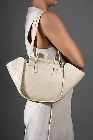 Beige Genuine Leather Metallic Embellished & Gold Embossed Bag by Akinna