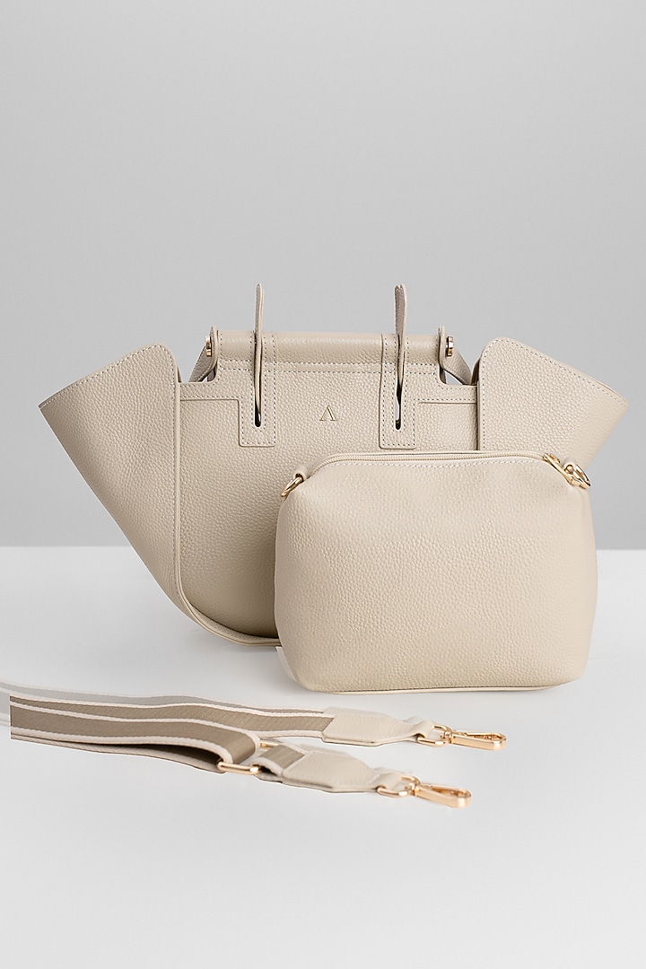 Beige Genuine Leather Metallic Embellished & Gold Embossed Bag by Akinna at Pernia's Pop Up Shop