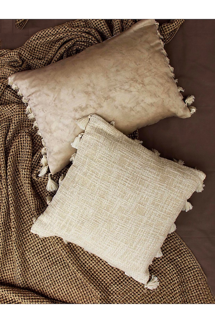 White Textured Tassel 
Cushion Cover by ALCOVE