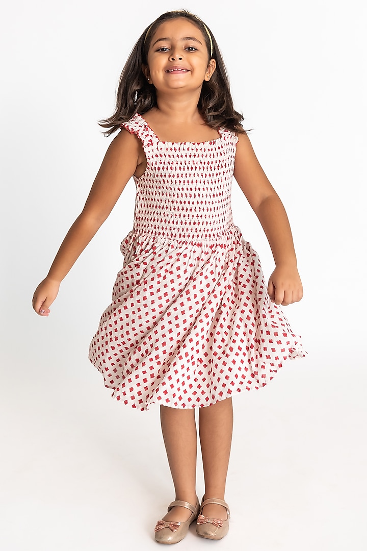 Red & White Cotton Block Printed Smocked Dress For Girls by A Little Fable