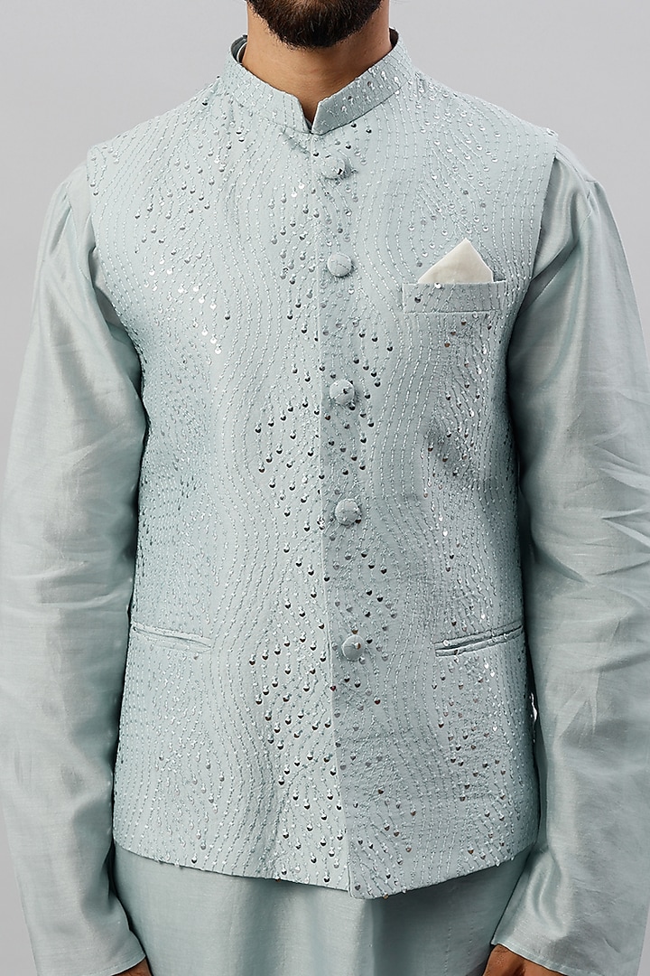 Powder Blue Spun Silk Mirror Embroidered Bundi Jacket by ALOUKIK at Pernia's Pop Up Shop