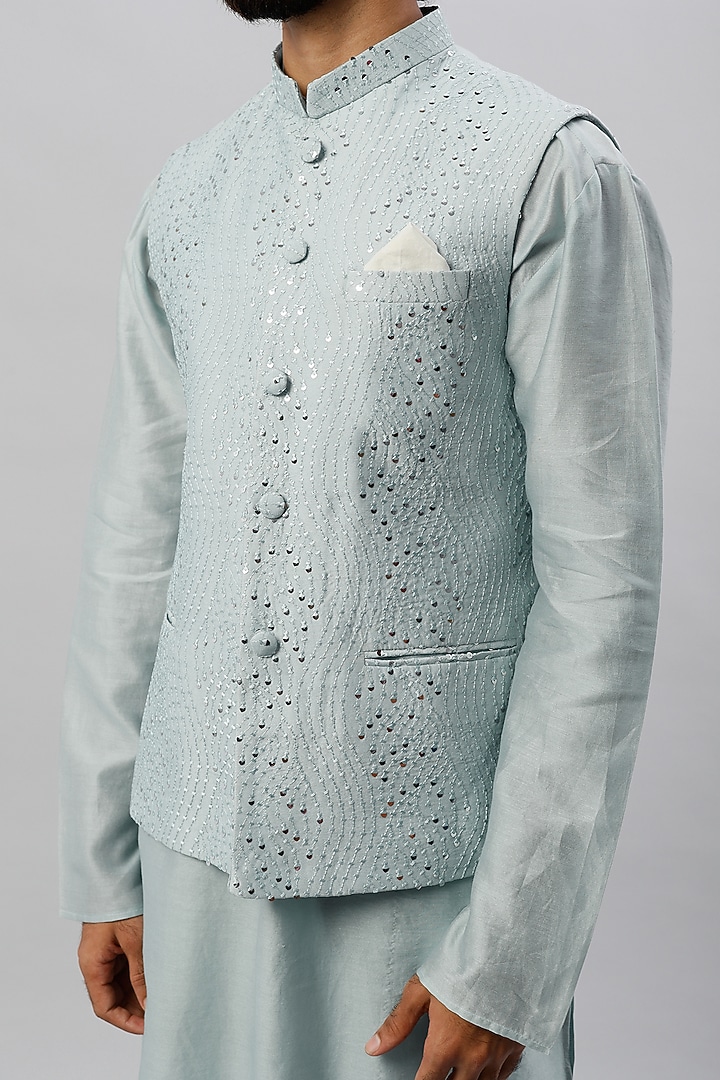 Powder Blue Spun Silk Mirror Embroidered Bundi Jacket by ALOUKIK at Pernia's Pop Up Shop