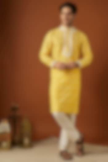 Yellow Tussar Printed & Embroidered Kurta Set by ALOUKIK