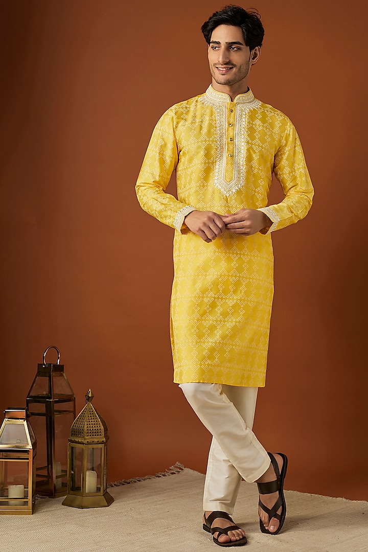 Yellow Tussar Printed & Embroidered Kurta Set by ALOUKIK