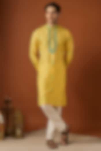 Yellow Tussar Printed & Embroidered Kurta Set by ALOUKIK