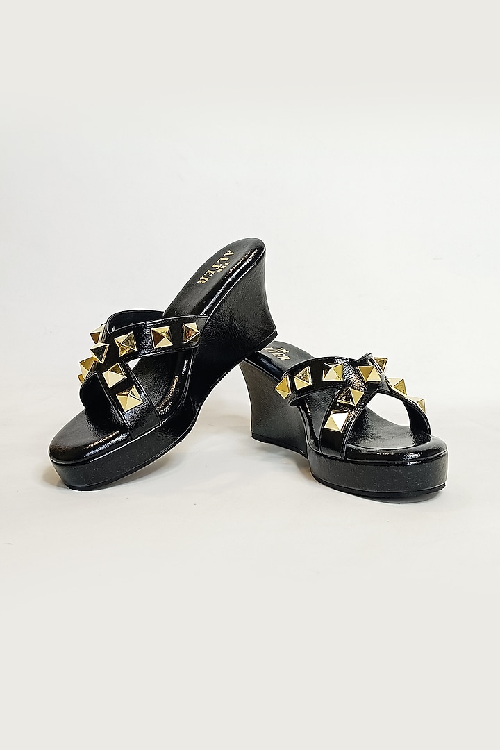 Black Vegan Faux Leather Studded Criss-Cross Wedges by The Alter at Pernia's Pop Up Shop