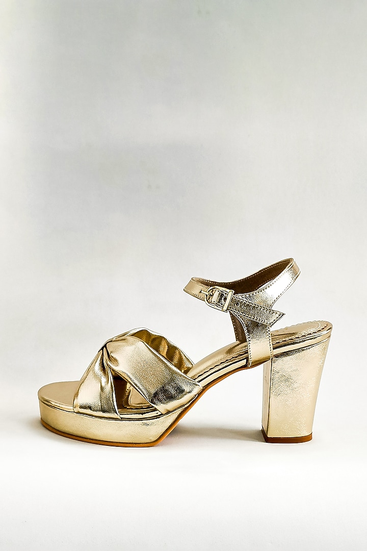 Gold Faux Leather Knotted Platform Block Heels by The Alter at Pernia's Pop Up Shop
