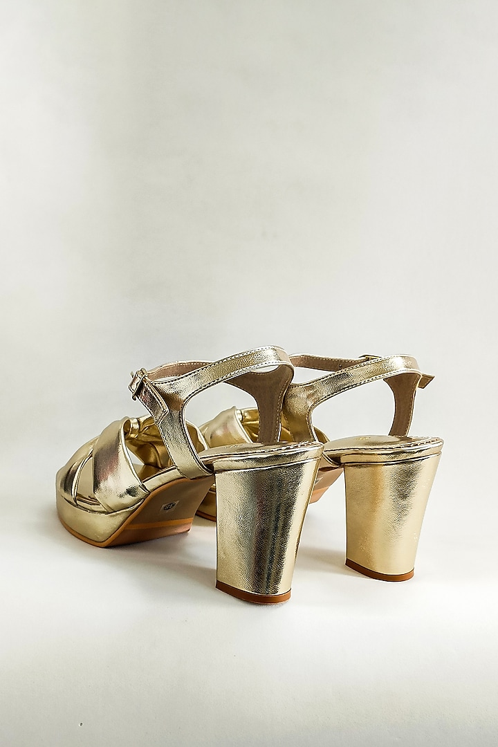 Gold Faux Leather Knotted Platform Block Heels by The Alter at Pernia's Pop Up Shop