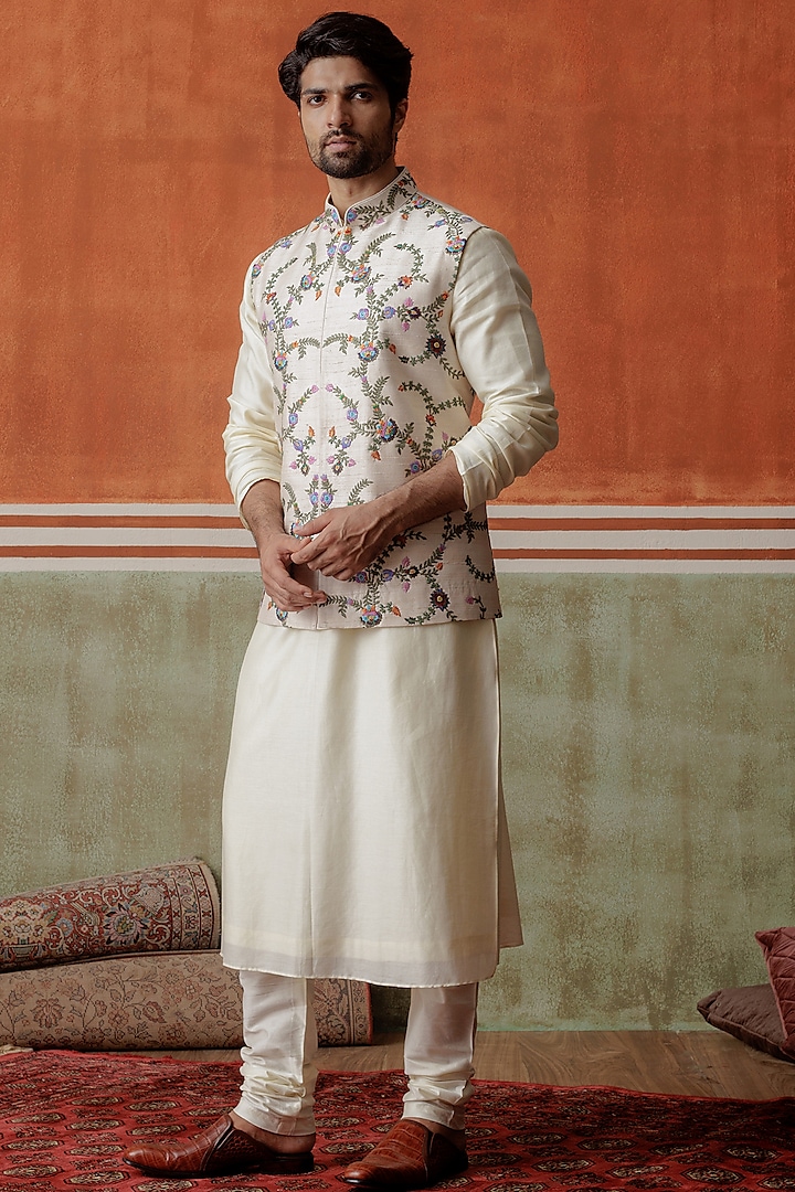 Ivory Raw Silk Kashmiri Embroidered Bundi Jacket by ALLUR
