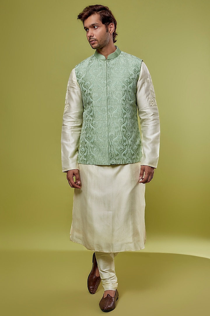 Green Raw Silk Hand Embroidered Nehru Jacket With Kurta Set by ALLUR