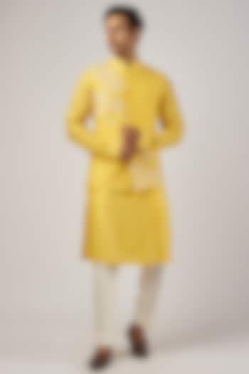 Yellow Silk Machine Embroidered Bundi Jacket Set by AL USTAAD