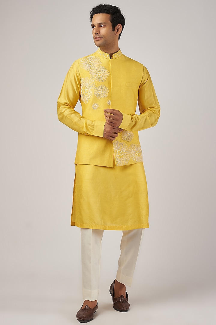 Yellow Silk Machine Embroidered Bundi Jacket Set by AL USTAAD