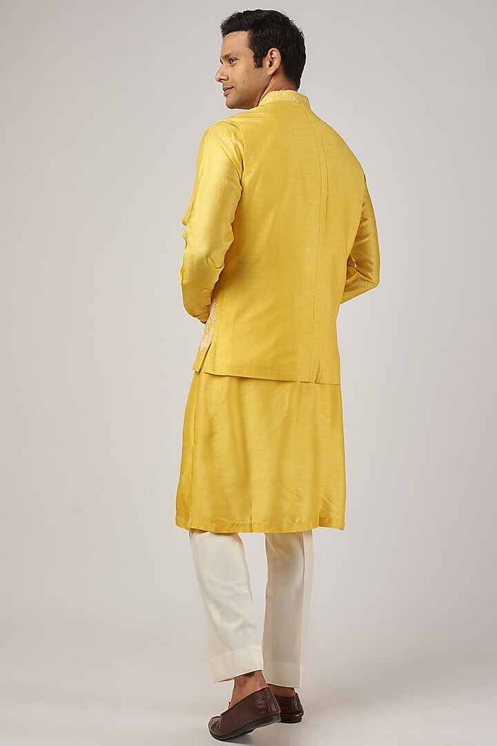 Yellow Silk Machine Embroidered Bundi Jacket Set by AL USTAAD at Pernia's Pop Up Shop