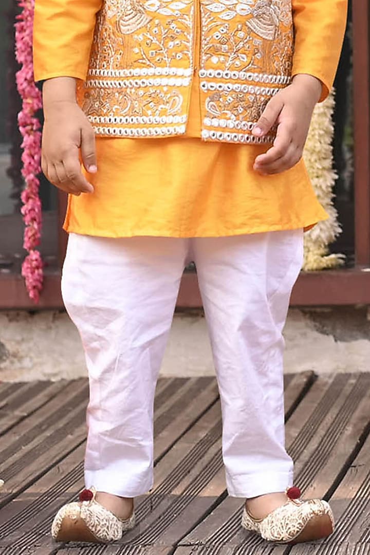 Yellow Raw Silk Cutwork Embroidered Bundi jacket Set For Boys by Alyaansh Couture at Pernia's Pop Up Shop