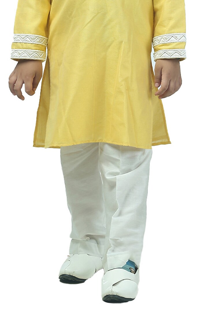 Pastel Yellow Cotton Silk Pearl Embellished Kurta Set For Boys by Alyaansh Couture at Pernia's Pop Up Shop