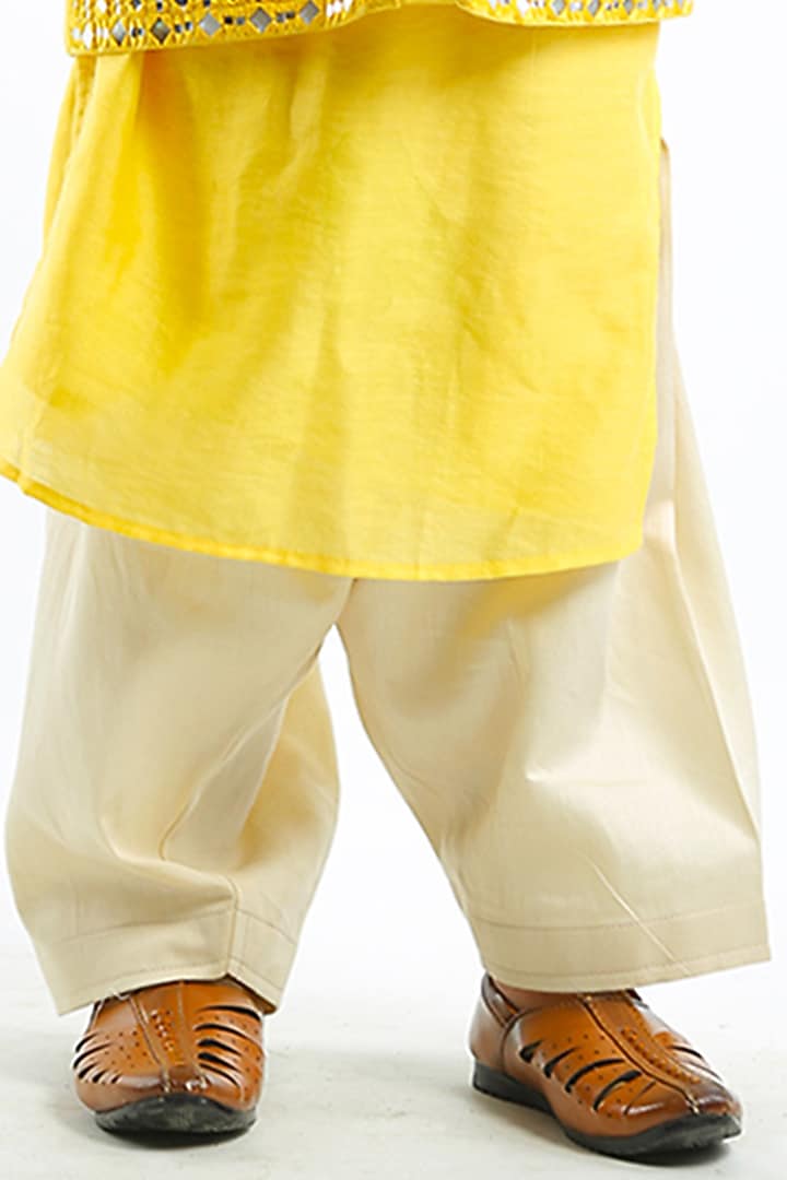 Yellow Raw Silk Mirror Work Kurta Set For Boys by Alyaansh Couture at Pernia's Pop Up Shop
