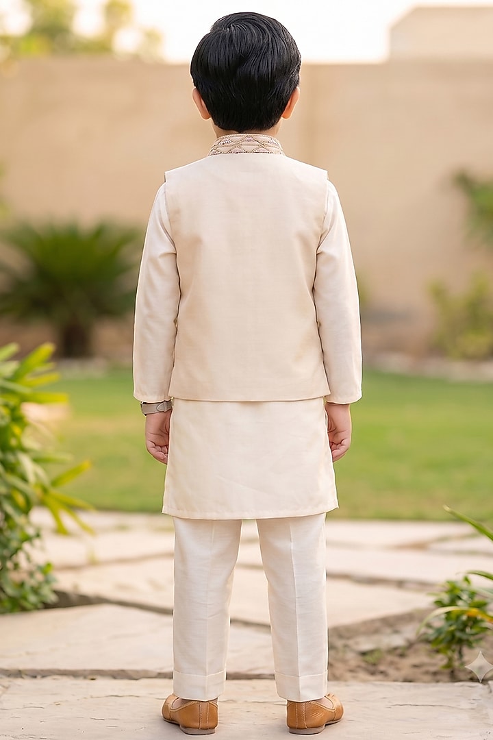Peach Glace Cotton & Silk Hand Embroidered Bundi Jacket Set For Boys by Alyaansh Couture at Pernia's Pop Up Shop