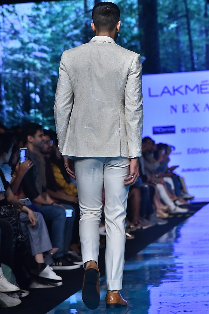 Ivory Embroidered Woolen Tuxedo Suit by Amaare at Pernia's Pop Up Shop