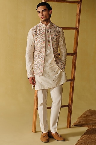 Ivory Raw Silk Tissue Nehru Jacket Set by Amaare