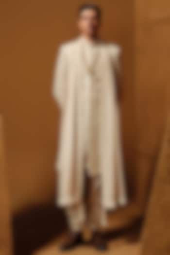 Ivory Raw Silk Thread Embroidered Groom Sherwani Set by Amaare at Pernia's Pop Up Shop