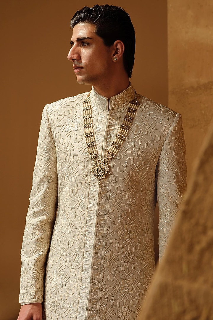 Ivory Raw Silk Thread Embroidered Groom Sherwani Set by Amaare at Pernia's Pop Up Shop