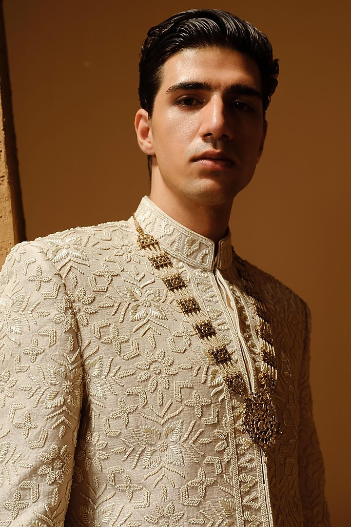 Ivory Raw Silk Thread Embroidered Groom Sherwani Set by Amaare at Pernia's Pop Up Shop