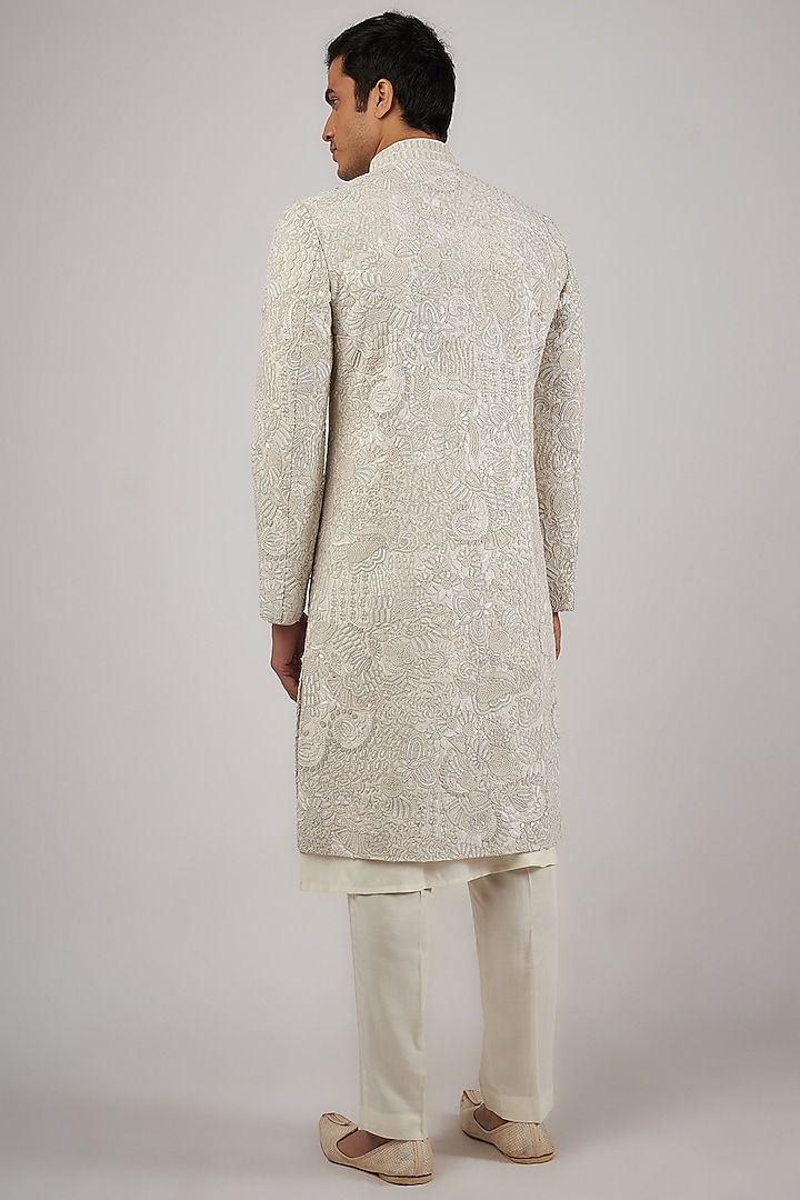 Ivory Raw Silk Sequins & Beads Hand Embroidered Groom Sherwani Set by Amaare at Pernia's Pop Up Shop