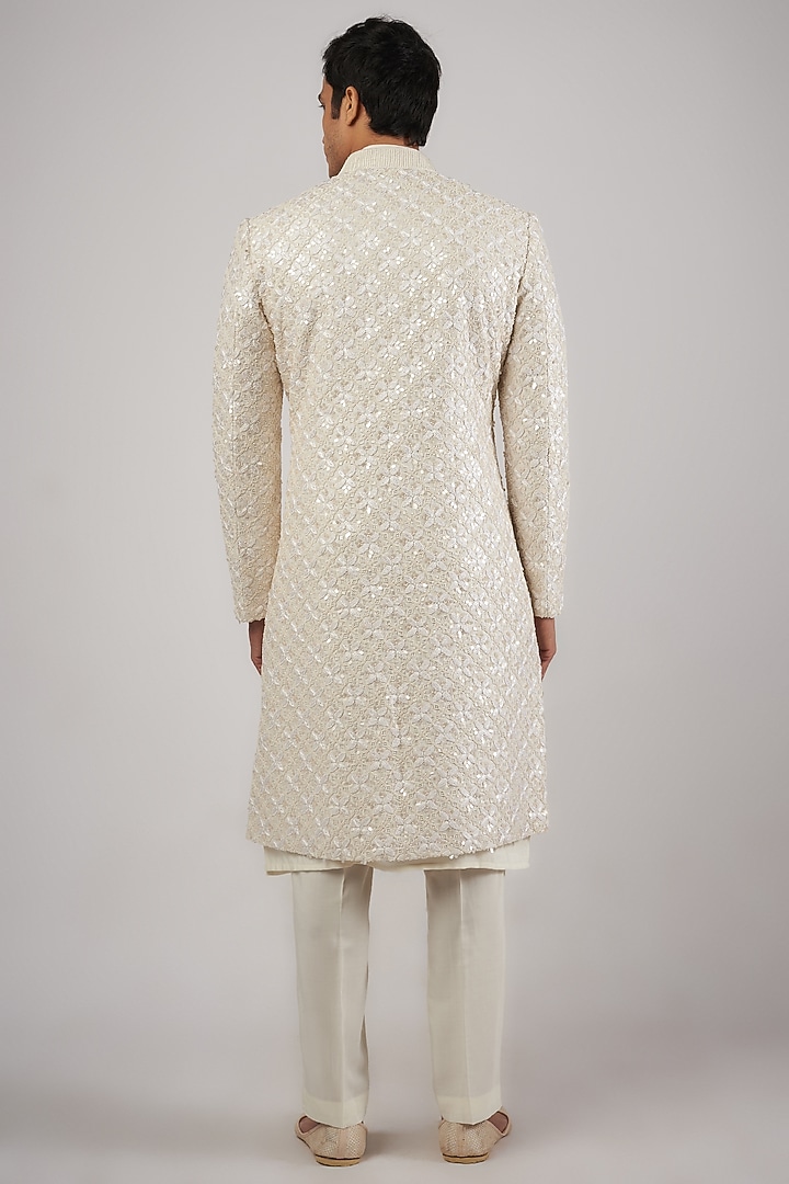 Ivory Raw Silk Sequins & Beads Hand Embroidered Groom Sherwani Set by Amaare at Pernia's Pop Up Shop