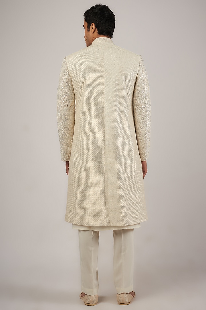 Ivory Raw Silk Sequins & Beads Hand Embroidered Groom Sherwani Set by Amaare at Pernia's Pop Up Shop