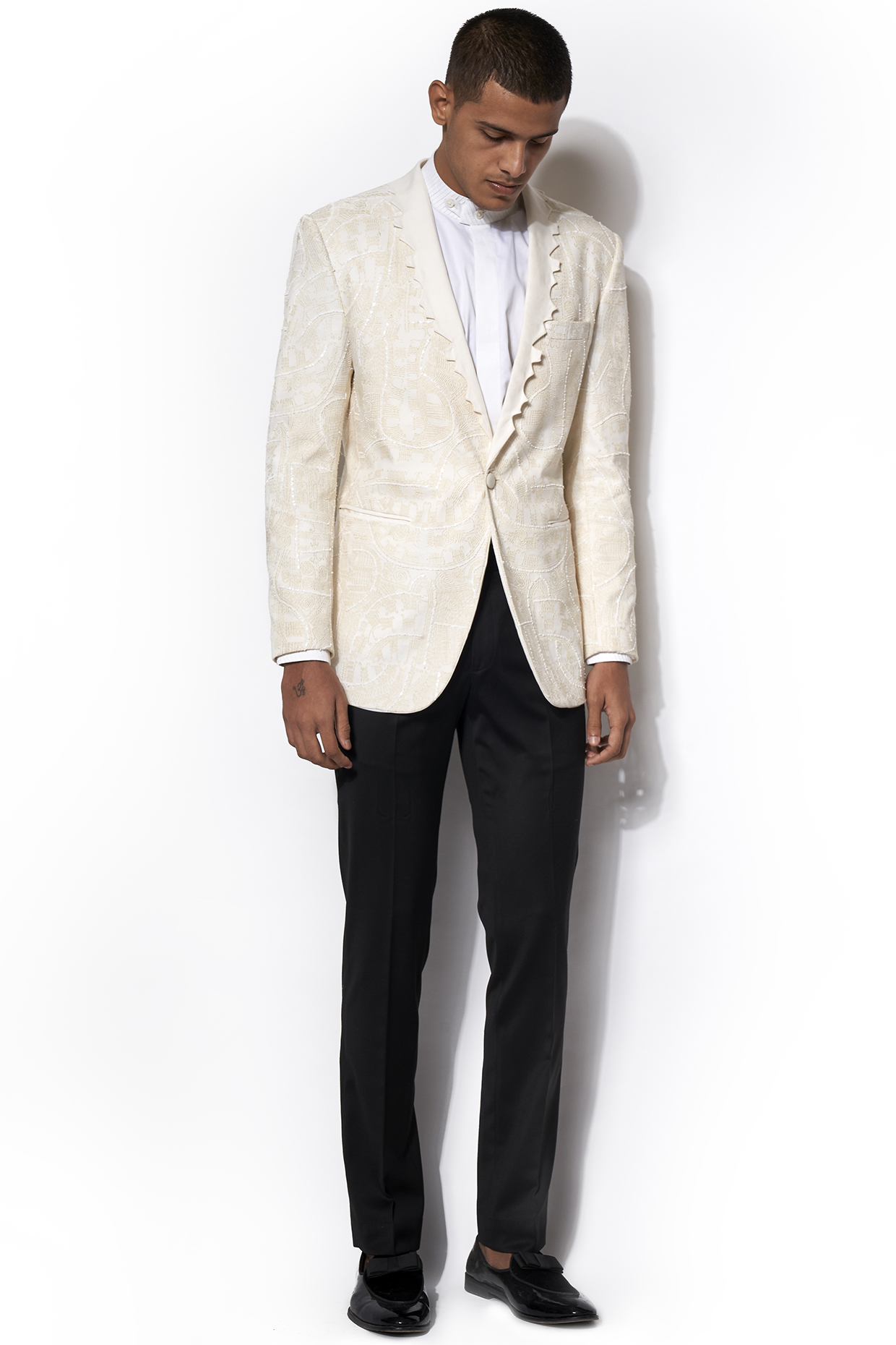 Ivory Asymmetric Lapel Tuxedo With Black Pants by Amaare at Pernia's Pop Up Shop