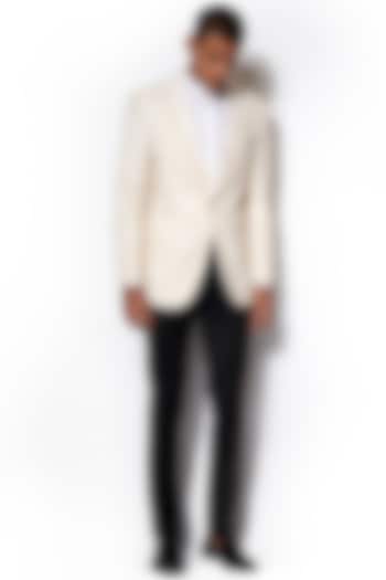 Ivory Asymmetric Lapel Tuxedo With Black Pants by Amaare