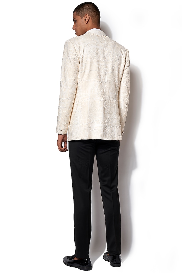 Ivory Asymmetric Lapel Tuxedo With Black Pants by Amaare at Pernia's Pop Up Shop