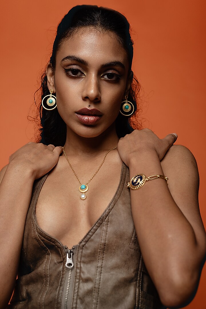 Gold Finish Pisces Bracelet by AMAMA at Pernia's Pop Up Shop