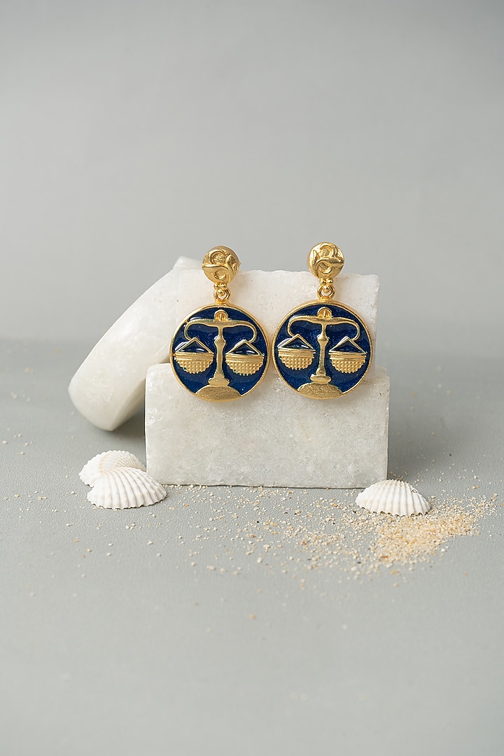 Gold Finish Libra Earrings In Brass by AMAMA at Pernia's Pop Up Shop